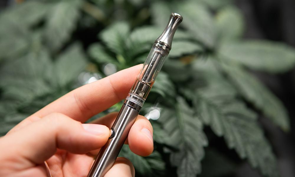Cannabis concentrates or CBD vape juice. Weed Vape Pens for THC Oil . CBD vape oils. simple electronic device.