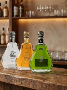 Lucky Stash Blanco, Botanical, and Extra Añejo tequila bottle lineup